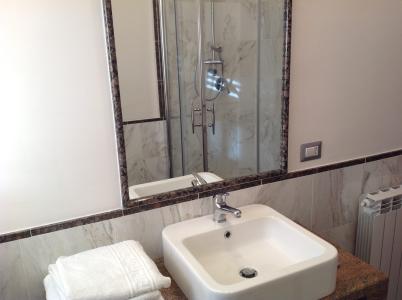 Bathroom of the two-bedroom apartment with balcony. 