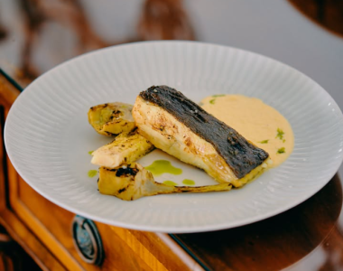 The catch of the day served with savory zabaglione and seasonal vegetables.